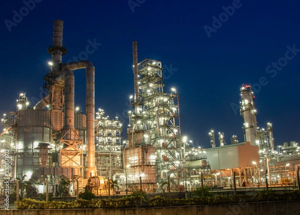 Obraz Oil and Gas Industrial zone,The equipment of oil refining,Close-up of industrial pipelines of an oil-refinery plant,Detail of oil pipeline with valves in large oil refinery.