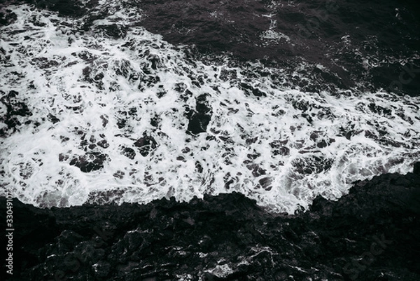 Fototapeta Waves breaking on the shore cliffs relaxing deep