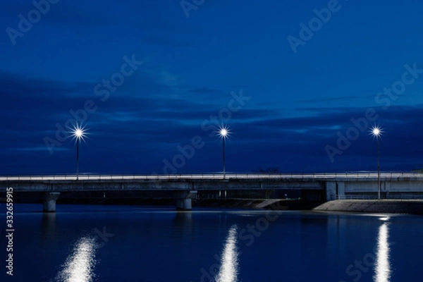 Fototapeta Bridge at Night / Dark Blue Midnight Photo Of City Dam