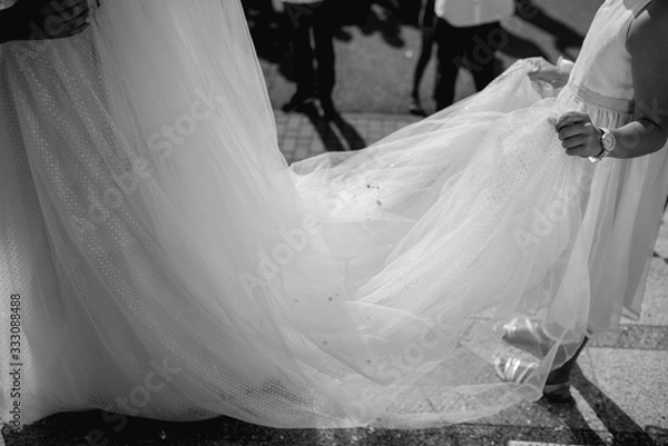 Fototapeta Beautiful black and white photo bride's wedding dress