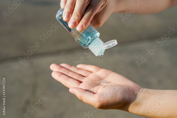 Fototapeta Wash your hands by alcohol gel. Wash your hands after handling dirt