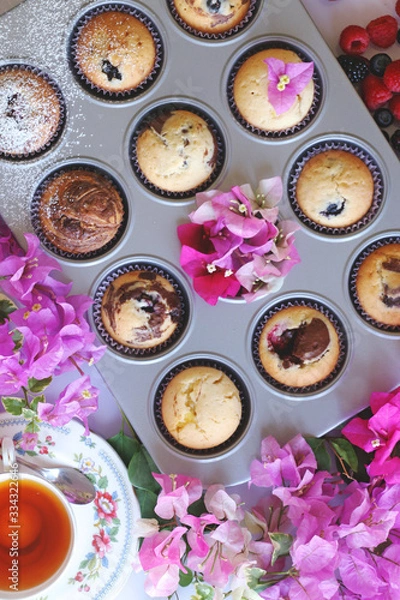 Fototapeta Muffins in form just baked