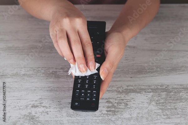 Fototapeta woman hand  remote control