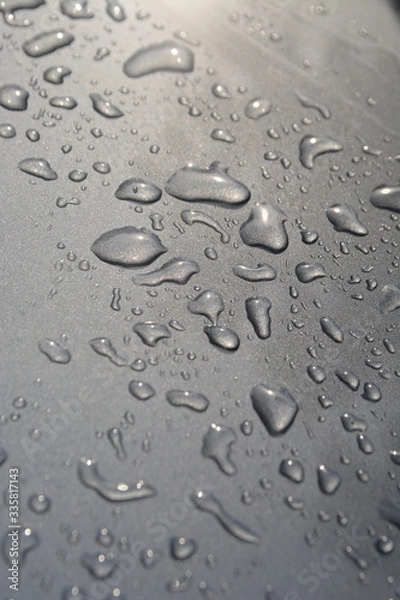 Fototapeta rain drops on metalic floor background