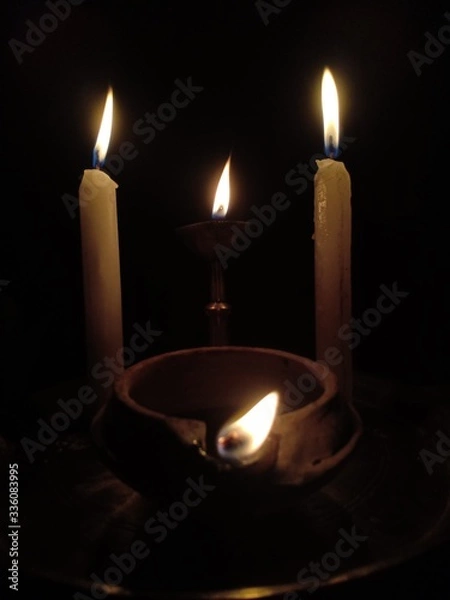 Fototapeta candles in the dark