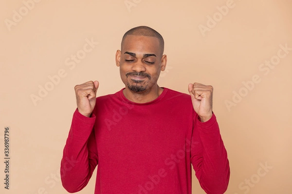 Fototapeta African guy with a red jersey