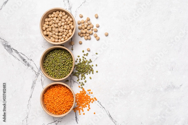 Fototapeta Bright set of red lentils, mung beans and chickpeas for healthy nutrition