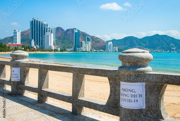 Fototapeta The deserted beach of the resort town of Nha Trang in April 2020, Vietnam.