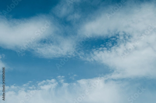 Fototapeta blue sky with fluffy clouds, background and texture