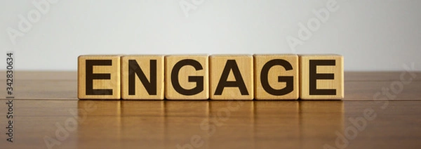 Fototapeta Concept word 'engage' on cubes on a beautiful wooden table