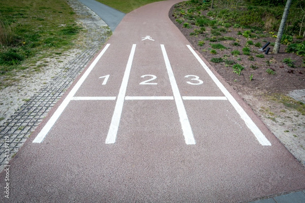 Fototapeta A running lane on the street. with 1 2 and 3