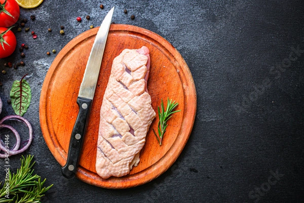 Fototapeta duck breast raw fillet meat, grilled meat.
Menu food background keto or paleo diet. top view. copy space for text