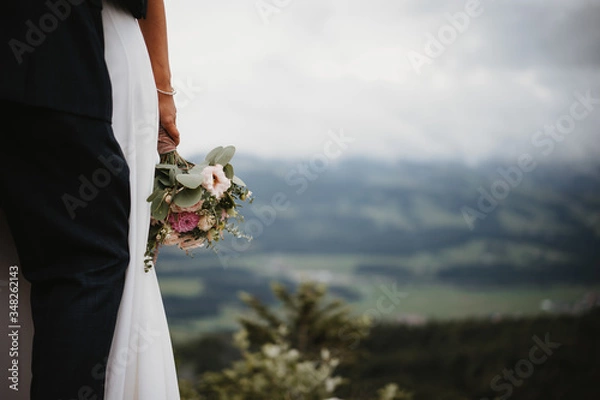 Fototapeta photo of a bride and a groom in the nature