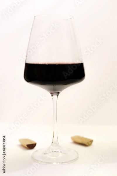 Fototapeta beautiful isolated glass of red wine on a white background