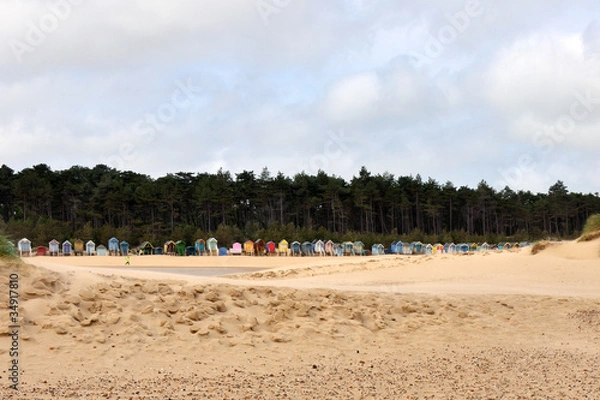 Fototapeta Traditional Beach Huts along the beach