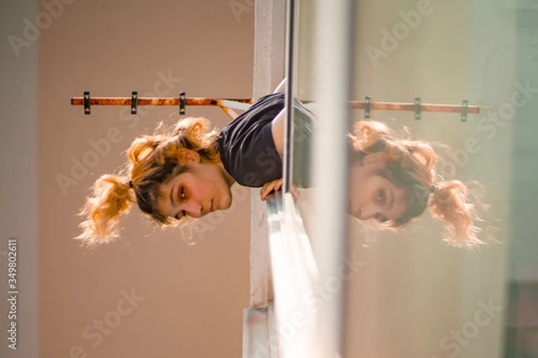 Fototapeta Blonde girl in window