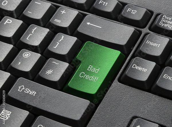 Fototapeta A Black Keyboard With Green Key Labelled Bad Credit