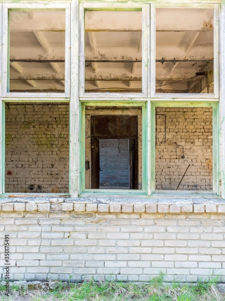 Fototapeta old brick wall with window