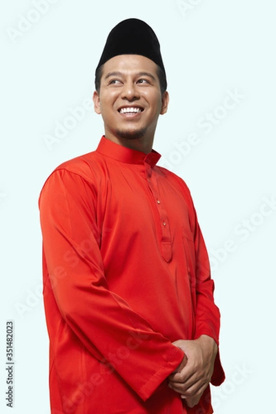 Fototapeta Man in traditional clothing smiling