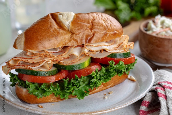 Fototapeta Turkey Submarine Sandwich on a Plate