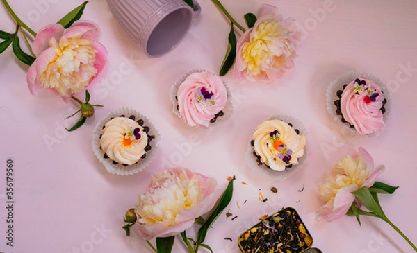 Fototapeta Pink peonies, cream cakes and flower tea