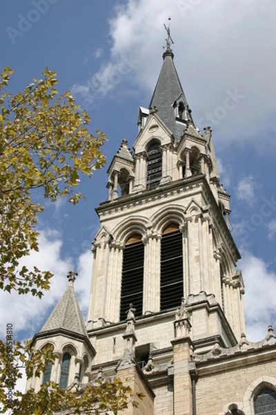 Fototapeta French church tower viewed from below