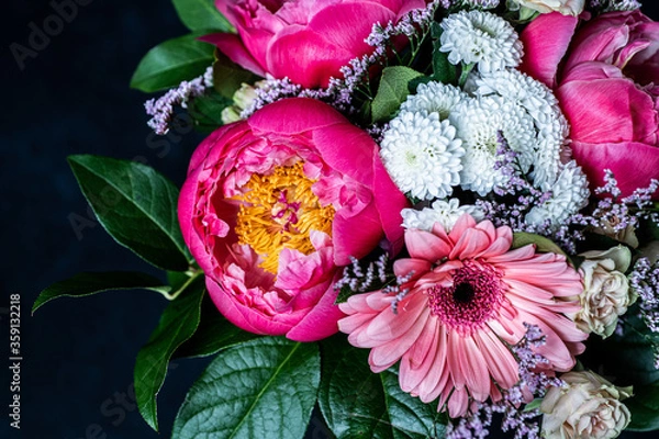 Fototapeta Fresh bouquet of peonies. Moody flower. Bright flower background. 