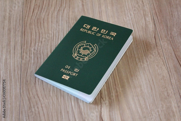 Fototapeta Republic of Korea passport on wooden texture