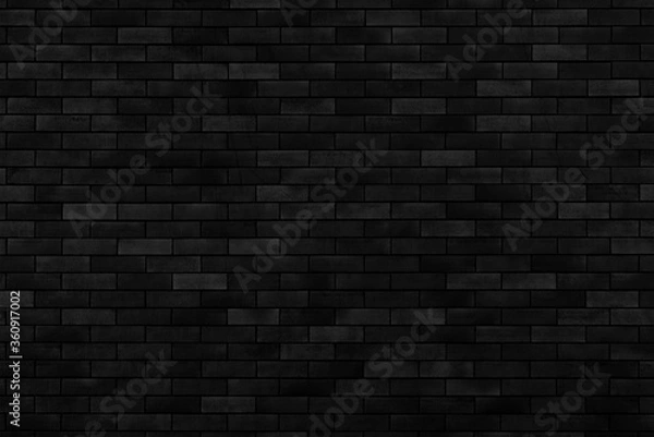 Fototapeta Black brick wall of building. Brick texture. Architectural abstract black background.