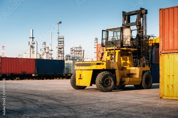 Obraz Container Ship Loading of Import/Export Freight Transportation Industry, Transport Crane Forklift is Lifting Box Containers at Port Cargo Shipping Dock Yard. Logistic Freighting Ship Service