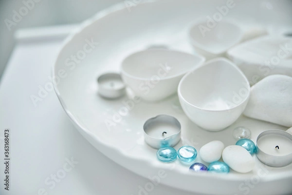 Fototapeta Little empty ceramic bowls placed on the tray