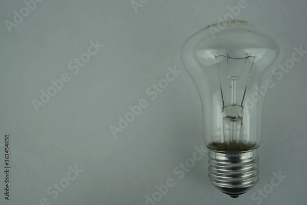 Fototapeta light bulb on black background