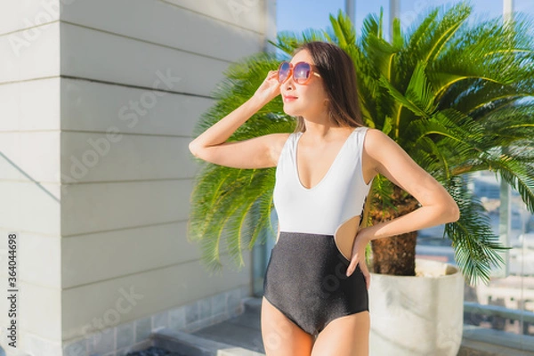 Fototapeta Portrait beautiful young asian woman relax leisure around swimming pool