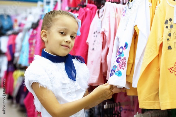 Fototapeta Young woman doing shopping