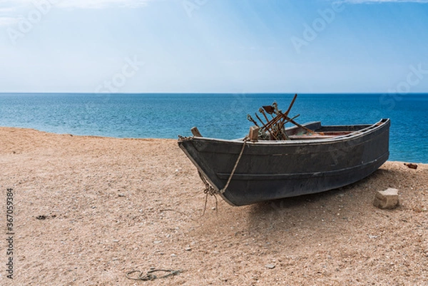 Fototapeta Fishing boat by the sea