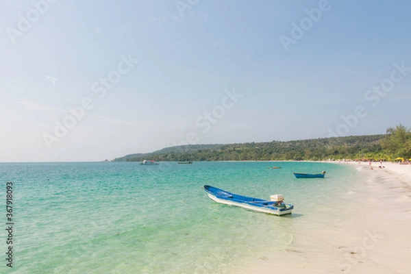 Fototapeta A small boat at the beach of Koh Rong Island, Cambodia