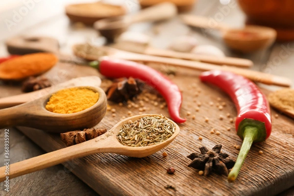 Fototapeta Many different spices on table, closeup