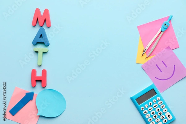 Fototapeta Composition with word MATH and stationery on color background