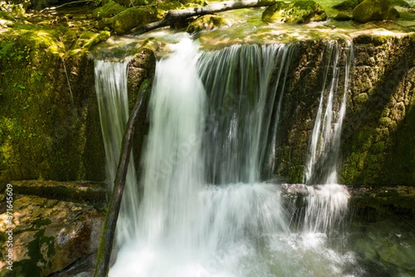 Fototapeta frontal aerial view of the waterfall produced by the orfento river in the majella mountain area abruzzo italy