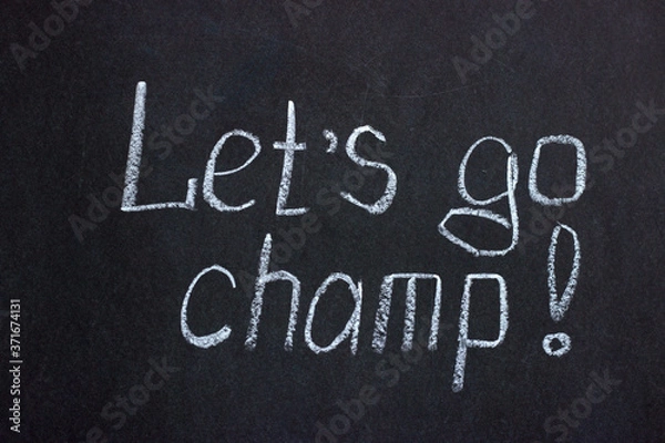 Fototapeta 
The inscription on the chalkboard "let's go, champ". Motivating phrase