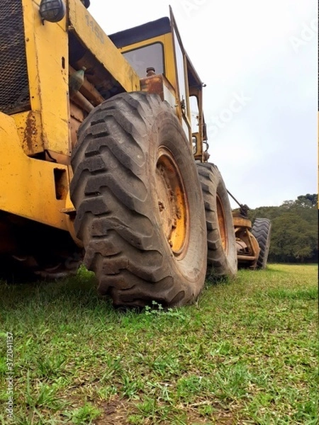 Fototapeta tractor in the field