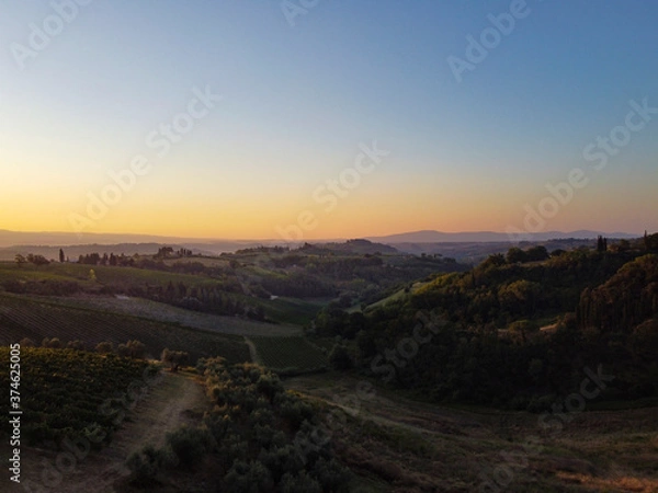 Fototapeta Tuscany lanscape in Italy. Sundown setting