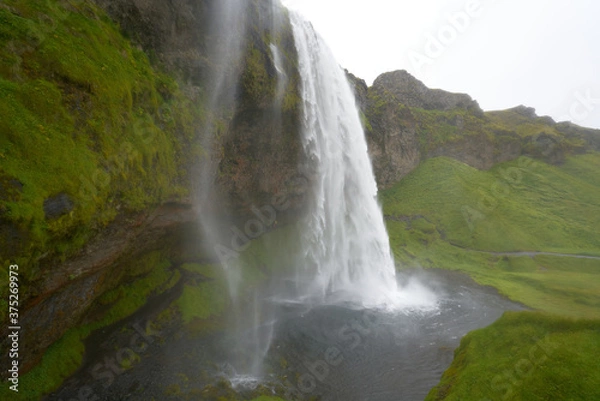 Fototapeta waterfall seljalandsfoss in iceland, one of the most famous and beautiful there is