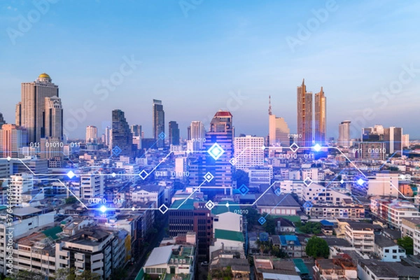 Fototapeta Glowing hologram of technological process, aerial panoramic cityscape of Bangkok at sunset. The largest innovative hub of tech services in Asia. Multi exposure.