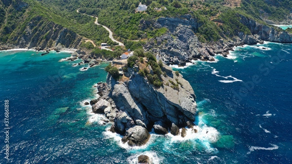 Fototapeta Aerial drone photo of picturesque chapel of Saint John built in famous cliff where Mamma Mia movie was filmed, Skopelos island, Sporades, Greece