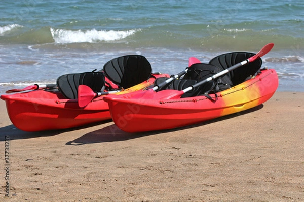 Fototapeta kayaks on beach