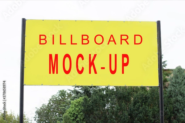 Fototapeta Mockup.Yellow billboard for advertising against the sky. Bright place for your text or ad