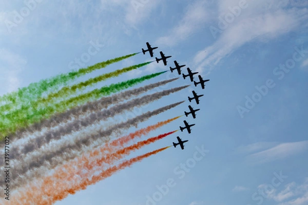 Fototapeta Airplanes flying in formation in a flight show , blue sky in the background. Air Show, Sky Aerobatic Team, Plane acrobatics, Planes.