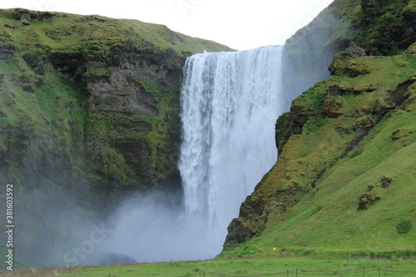 Fototapeta Skogafoss Waterfall in South Iceland on a misty summer day