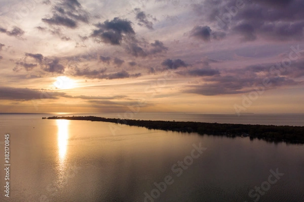 Fototapeta Sunset over Lake Huron bay in summer in Michigan